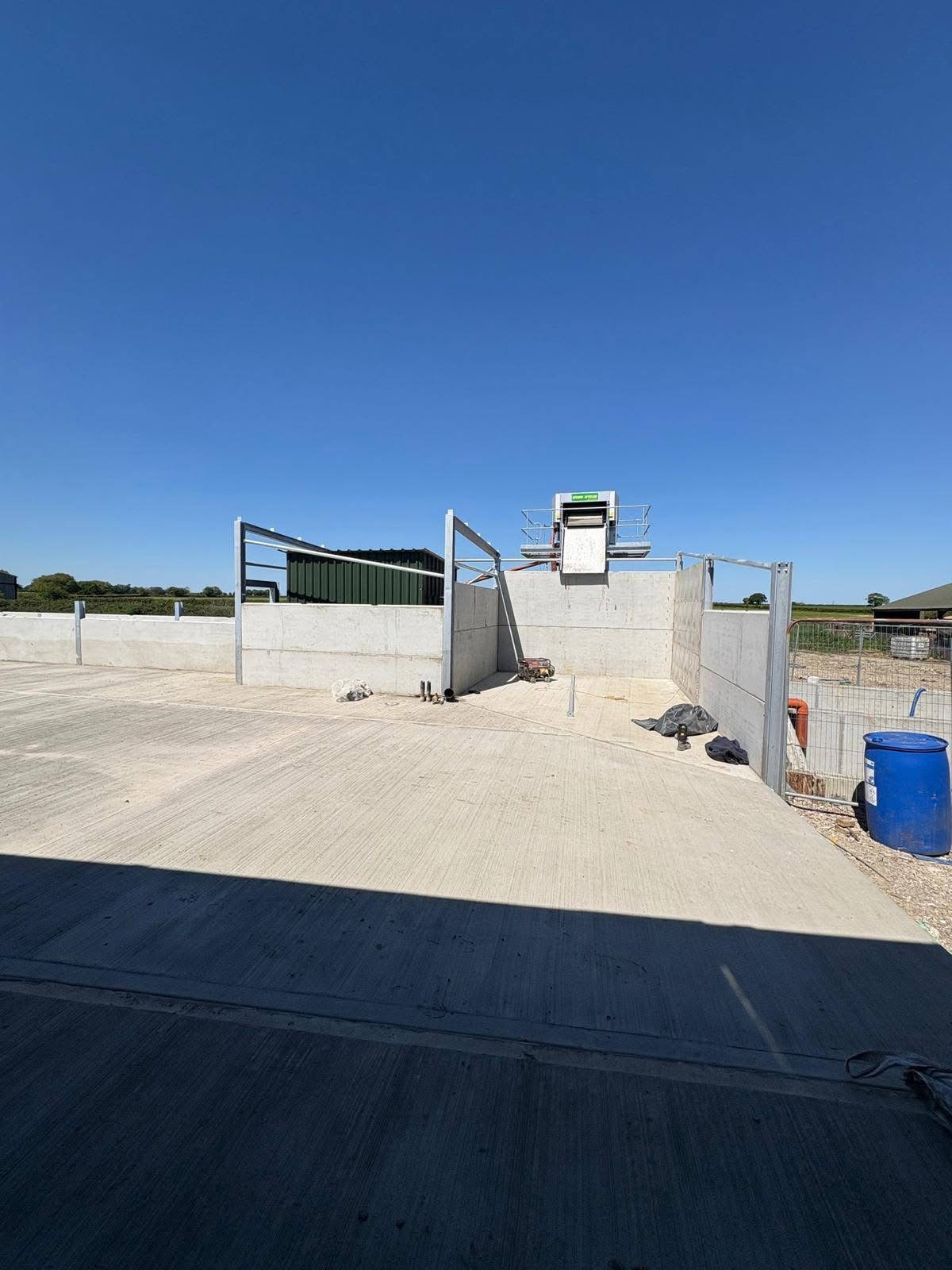 Concrete floor and retaining walls during agricultural construction