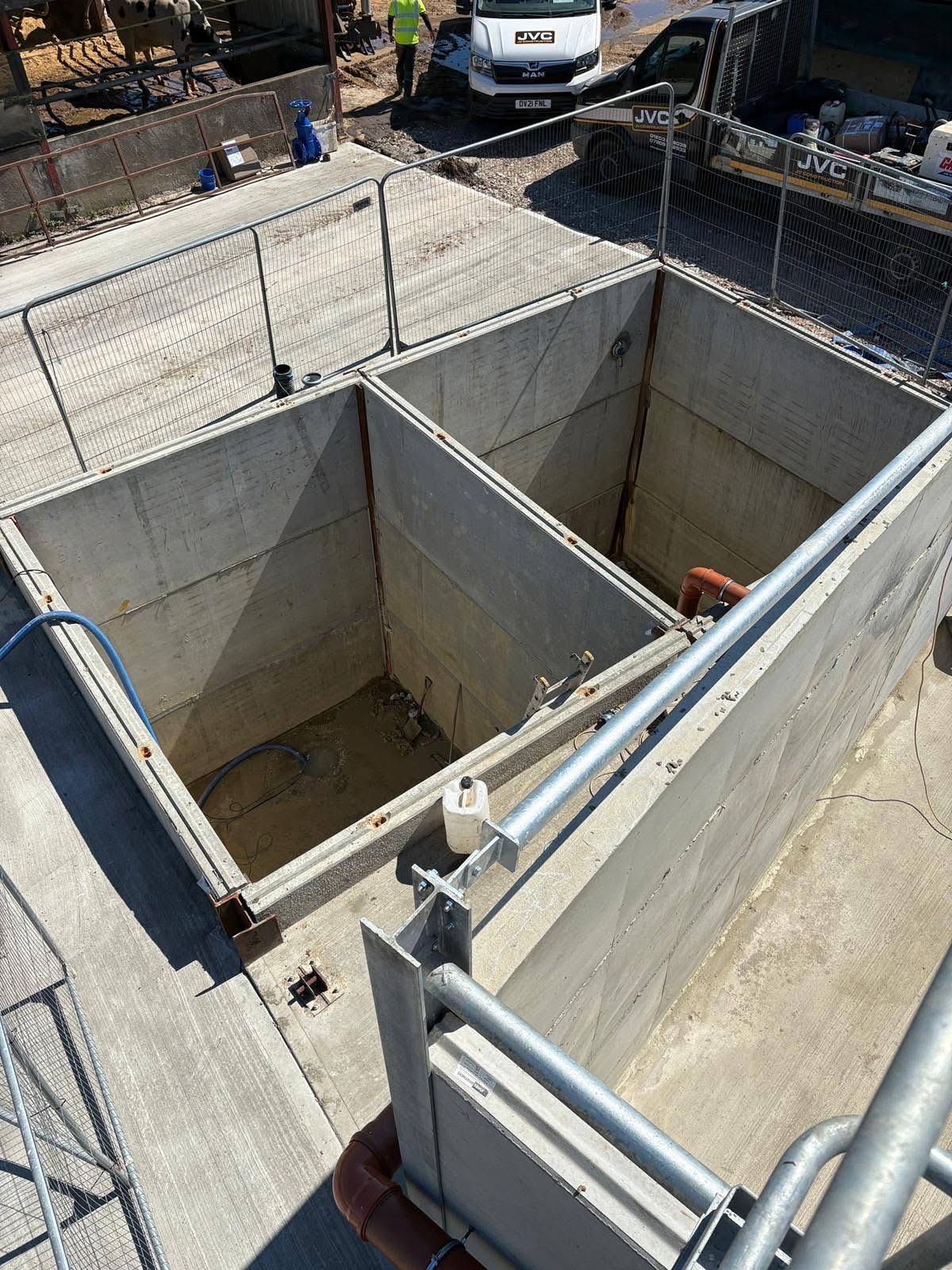 Deep concrete retaining structure under construction