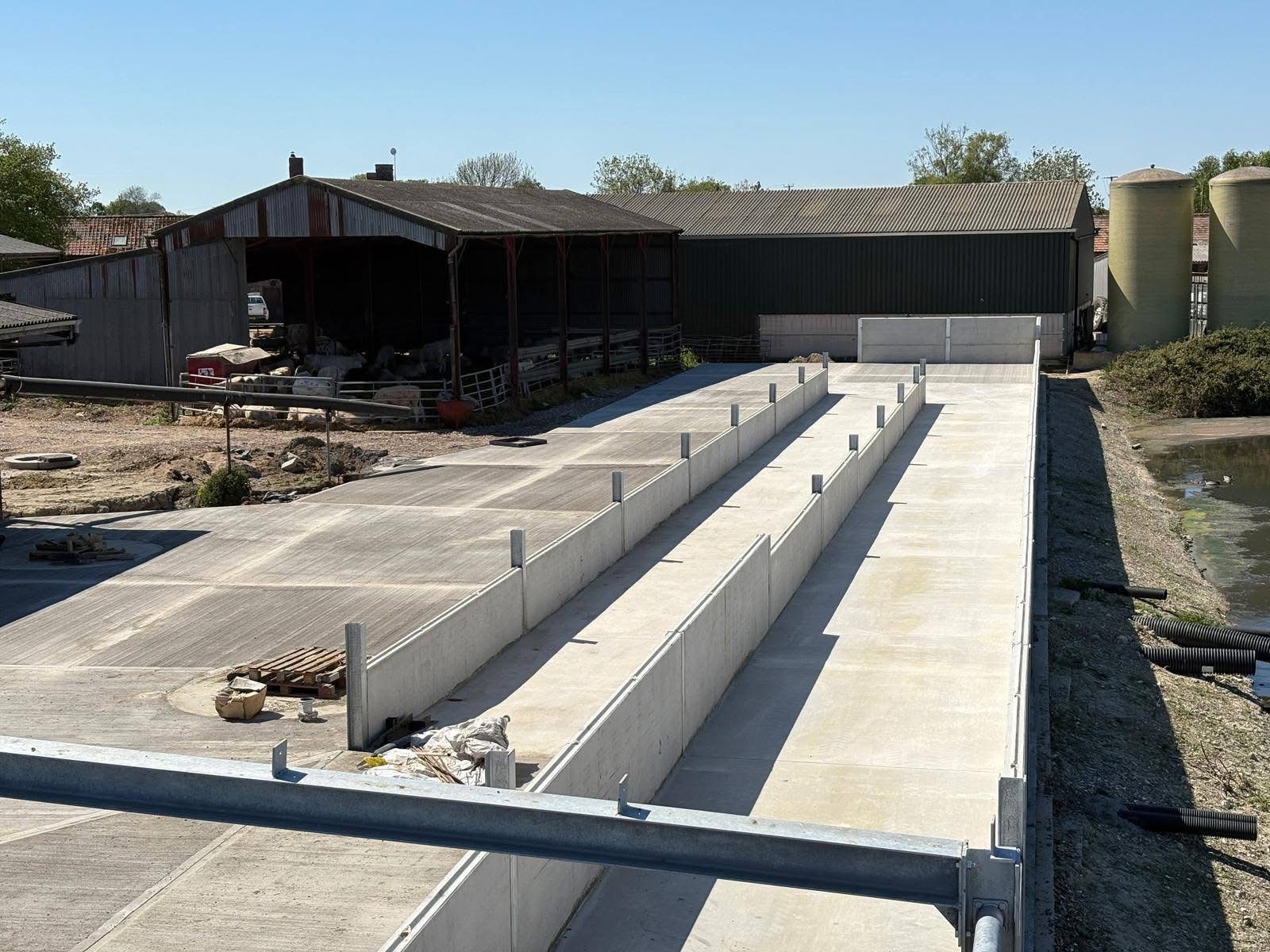 New concrete bays and dividing walls constructed on a working farm